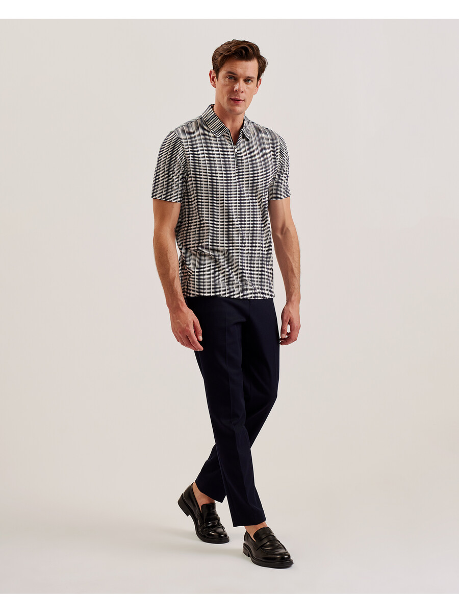 octon - geo-stribet poloshirt med lynlåsudskæring